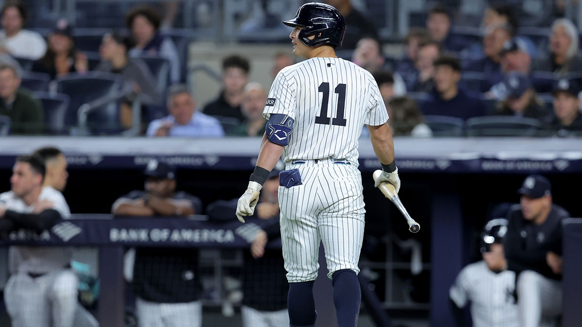New York Yankees shortstop Anthony Volpe (11) walks back to the dugout after failing to lay down a sacrifice bunt during the fifth inning against the Detroit Tigers at Yankee Stadium.