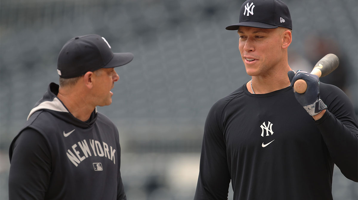 Yankees manager Aaron Boone (left) talks with right fielder Aaron Judge (right) before the game against the Pittsburgh Pirates at PNC Park