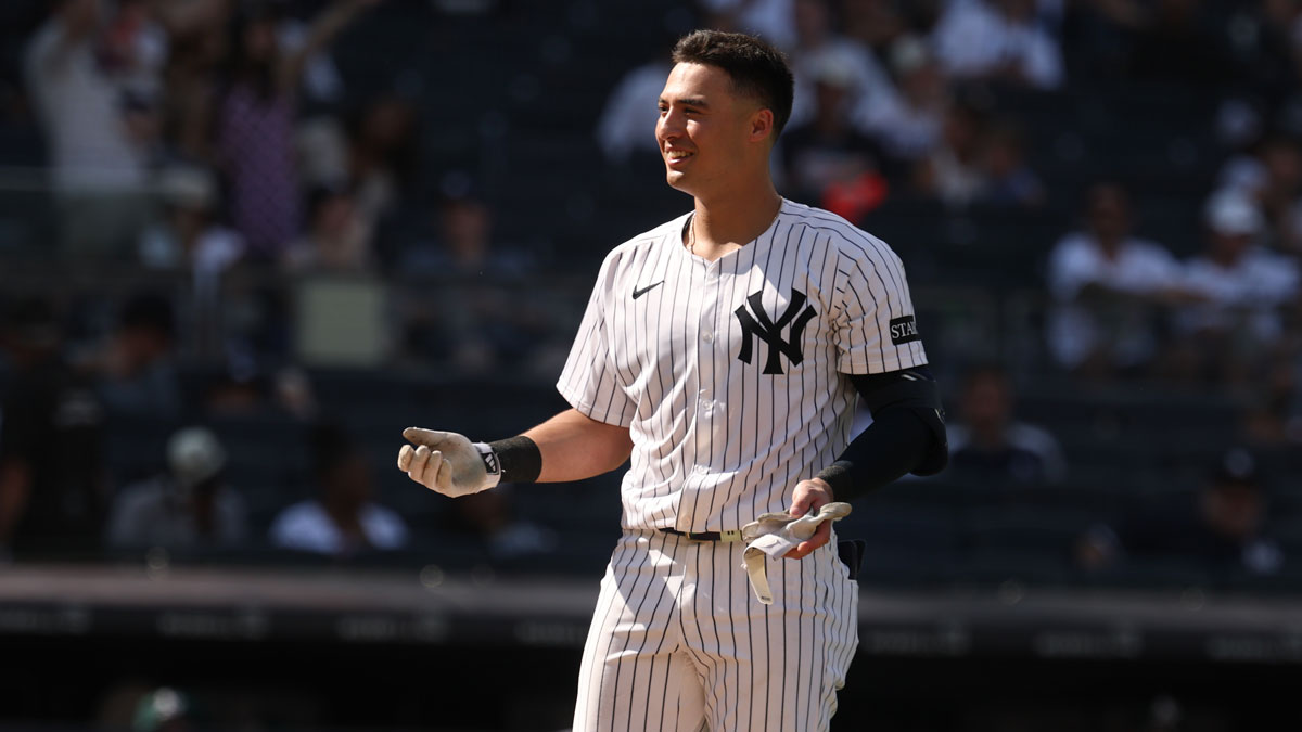 New York Yankees shortstop Anthony Volpe (11) reacts after being ejected for arguing after striking out during the eighth inning against the Athletics at Yankee Stadium.