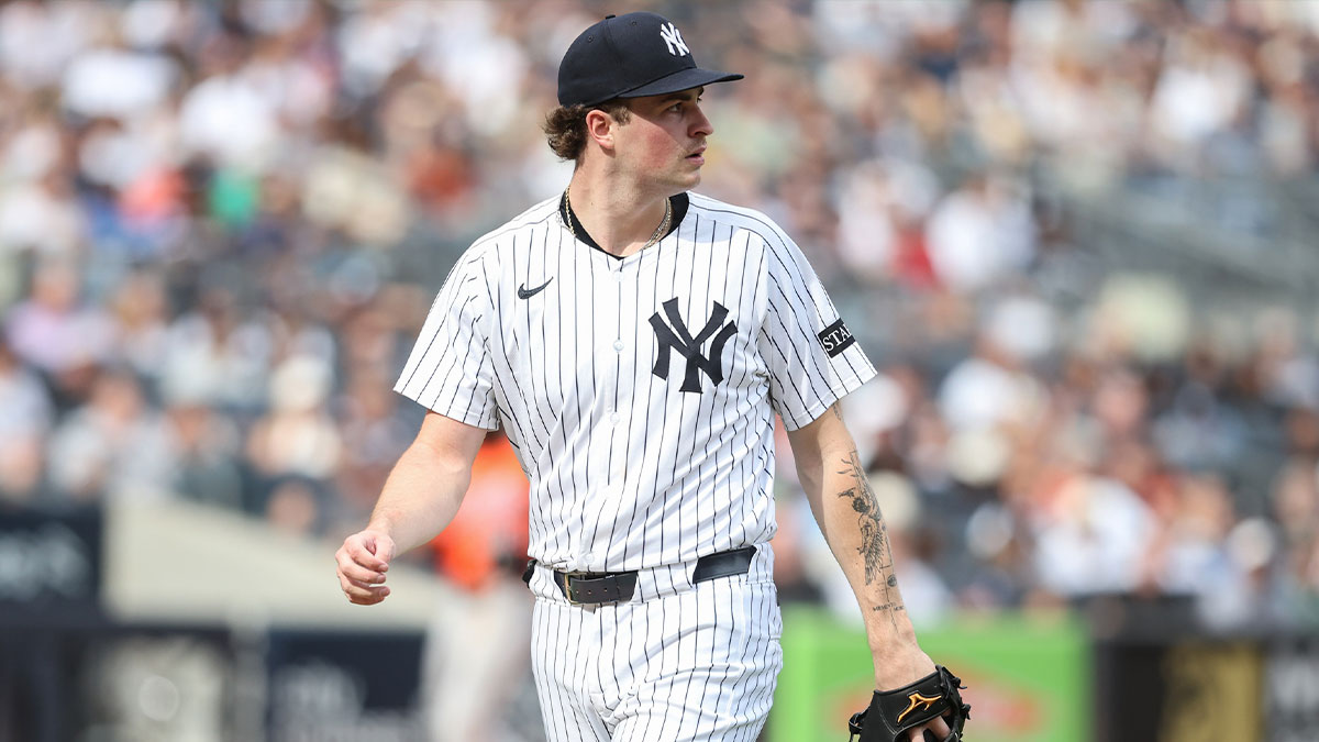 New York Yankees starting pitcher Cam Schlittler (31) walks off the mound after retiring the side in the fourth inning against the Baltimore Orioles at Yankee Stadium. Mandatory Credit: Wendell Cruz-Imagn Images