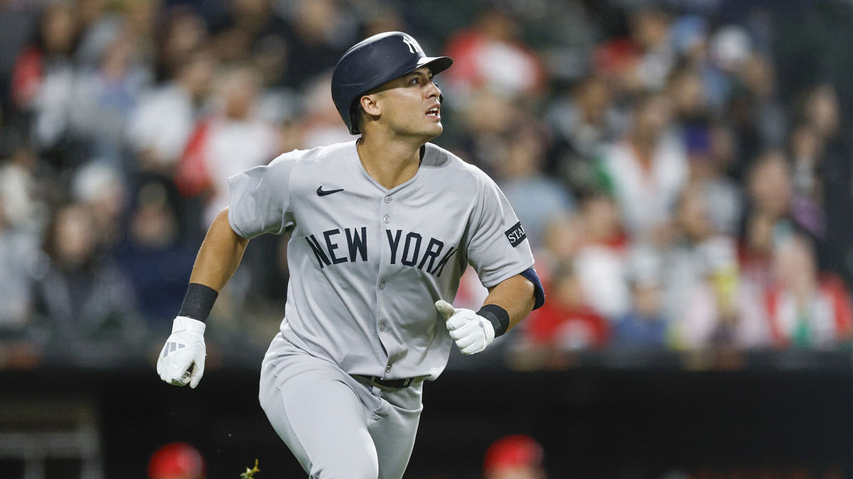 New York Yankees shortstop Anthony Volpe (11) rounds the bases after hitting a two-run home run against the Chicago White Sox during the seventh inning at Rate Field.