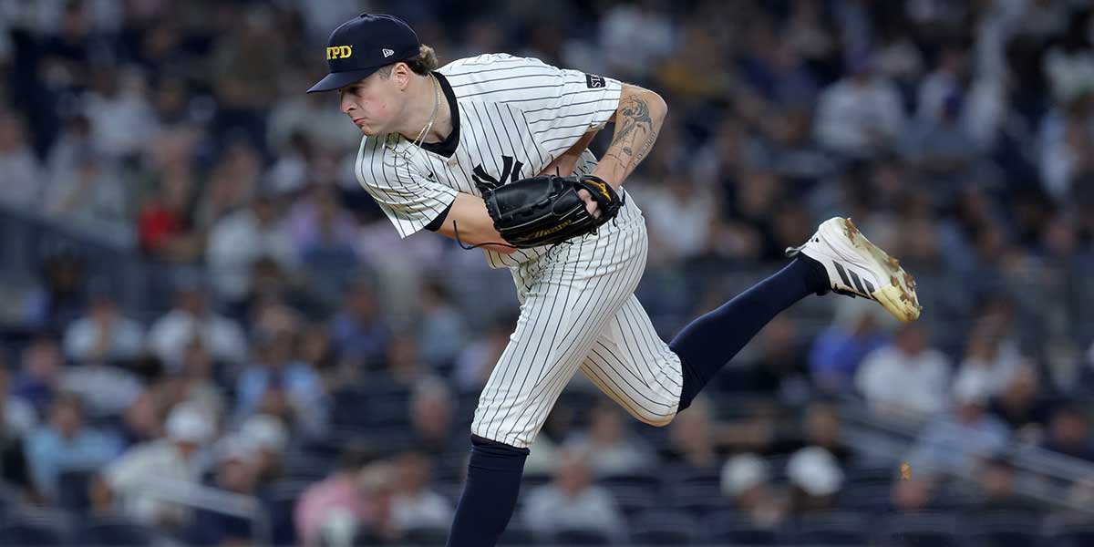 Yankees starting pitcher Cam Schlittler (31) follows through