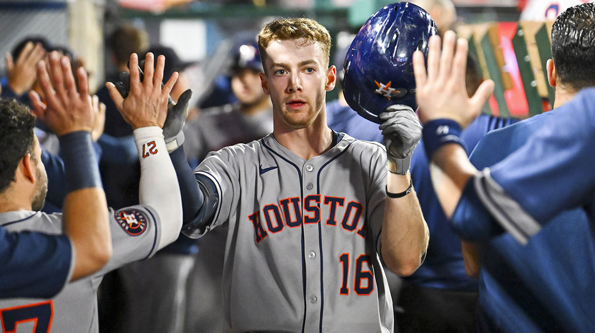 Houston Astros outfielder Zach Cole (16) celebrates with teammates after hitting a two run home run against the Los Angeles Angels during the second inning at Angel Stadium.