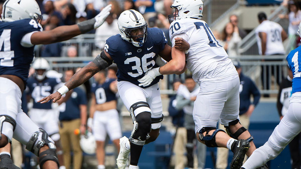 Penn State defensive end Zuriah Fisher (36) rushes the quarterback during the Blue-White game at Beaver Stadium on Saturday, April 26, 2025, in State College. The White team defeated the Blue team, 10-8.