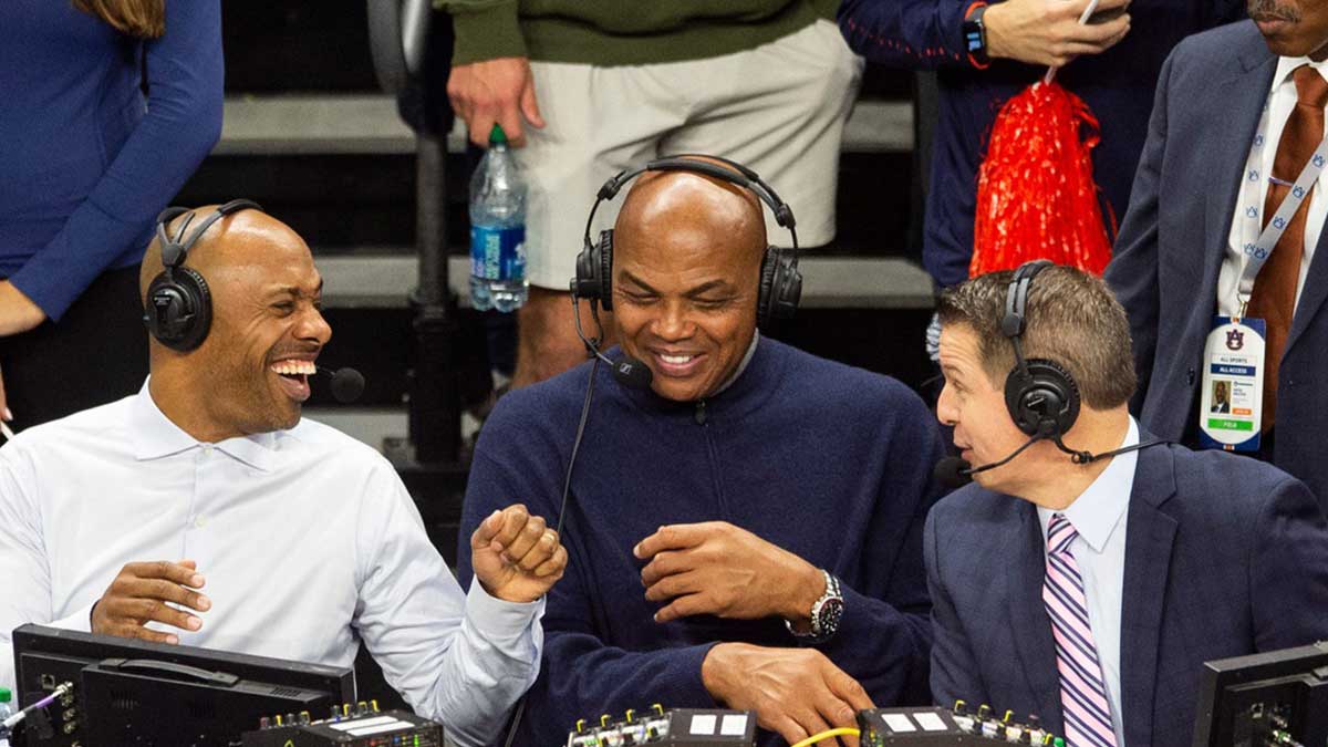Charles Barkley jokes with announcers Jay Williams, left, and Roxy Bernstein, right, as Auburn Tigers take on USC Trojans at Neville Arena in Auburn, Ala., on Sunday, Dec. 17, 2023. Auburn Tigers defeated USC Trojans 91-75.