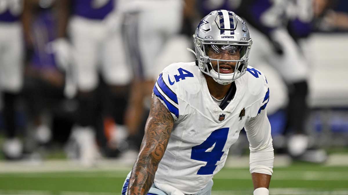 Dallas Cowboys quarterback Dak Prescott (4) warms up before the game against the Baltimore Ravens at AT&T Stadium. Mandatory Credit: Jerome Miron-Imagn Images