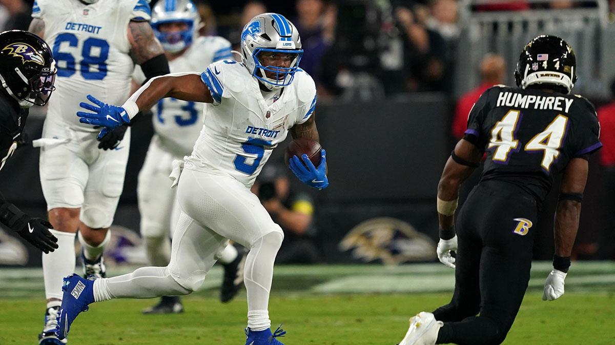 Detroit Lions running back David Montgomery (5) rushes the ball against the Baltimore Ravens during the first half at M&T Bank Stadium.