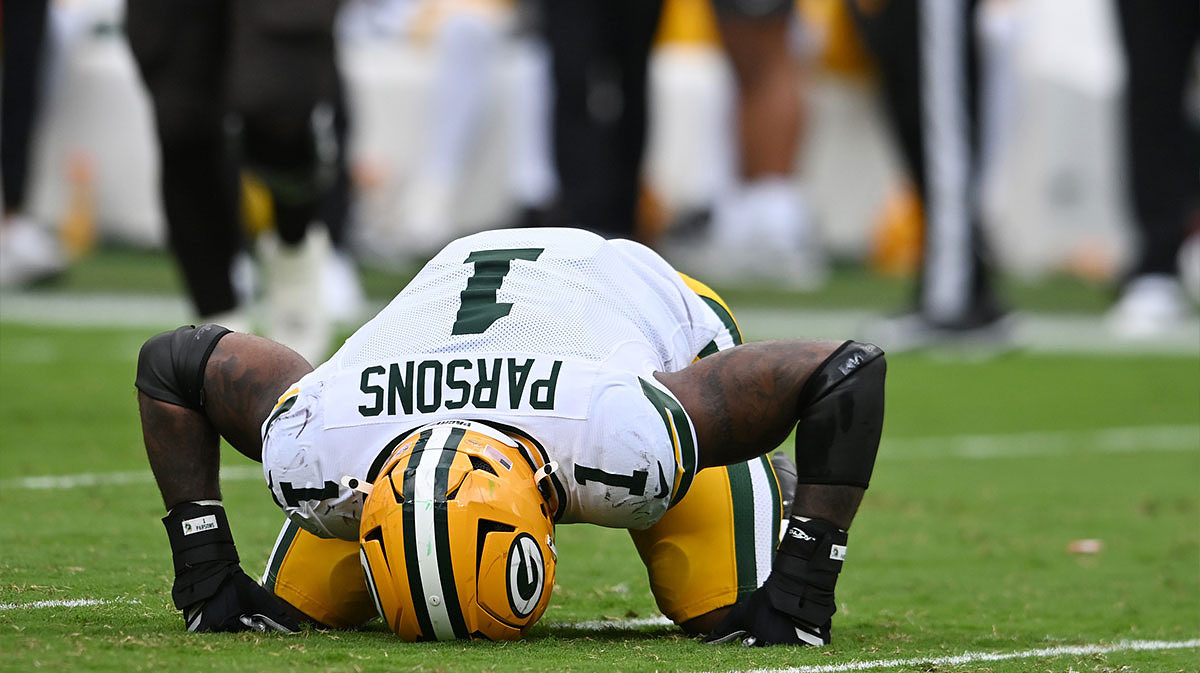 Green Bay Packers defensive end Micah Parsons (1) reacts after a play against the Cleveland Browns during the second half at Huntington Bank Field.