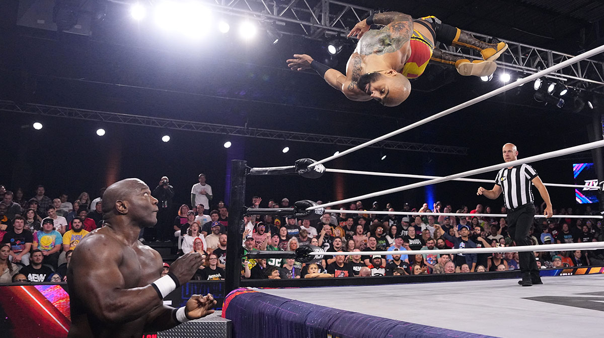AEW star Ricochet performing a flip.
