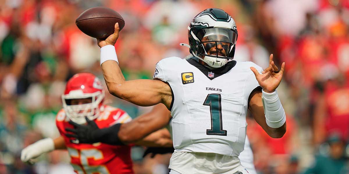 Philadelphia Eagles quarterback Jalen Hurts (1) passes the ball against the Kansas City Chiefs during the first quarter of the game at GEHA Field at Arrowhead Stadium.