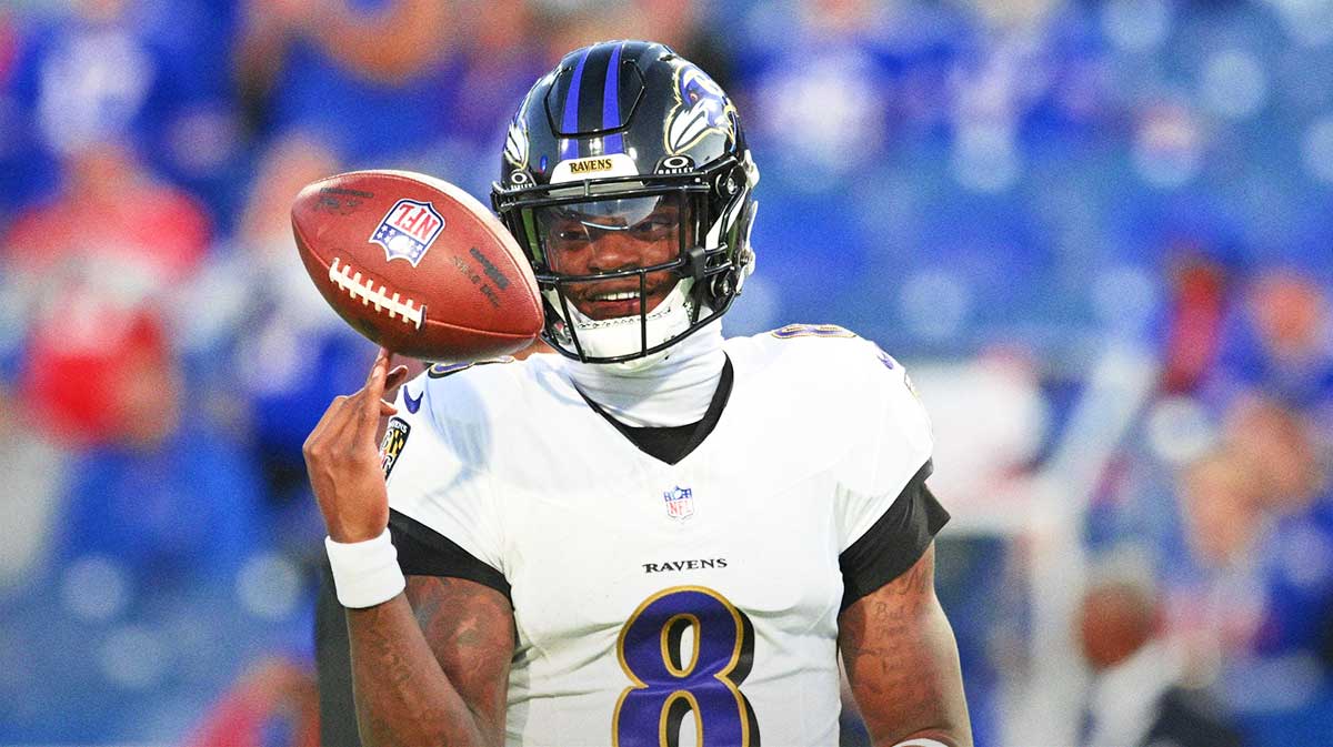 Baltimore Ravens quarterback Lamar Jackson (8) warms up prior to the game against the Buffalo Bills at Highmark Stadium.