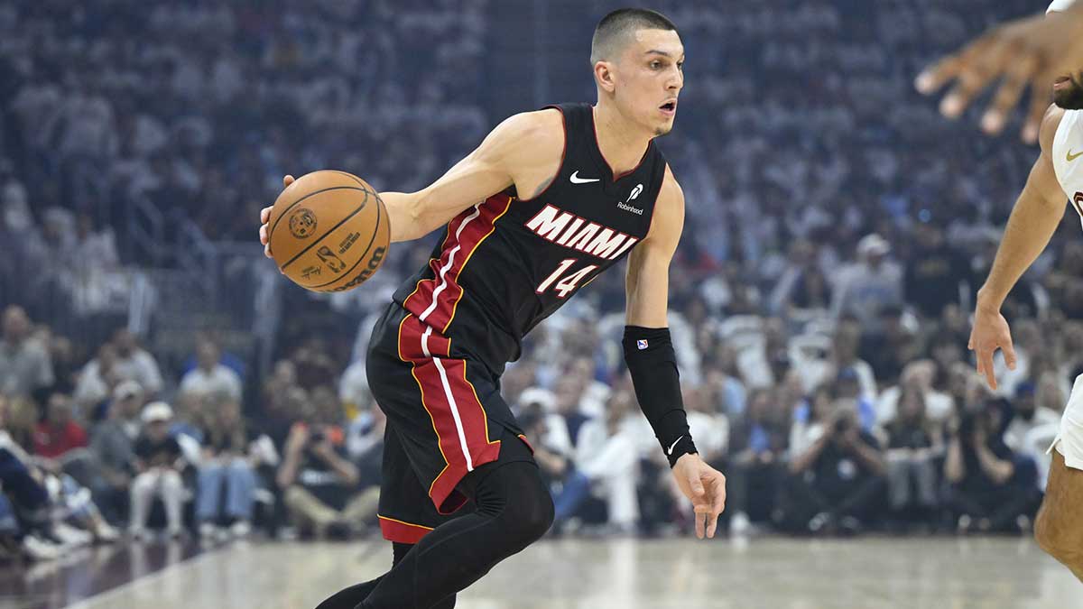 Miami Heat guard Tyler Herro (14) dribbles against the Cleveland Cavaliers in the first quarter of game two of the first round of the 2025 NBA Playoffs at Rocket Arena.