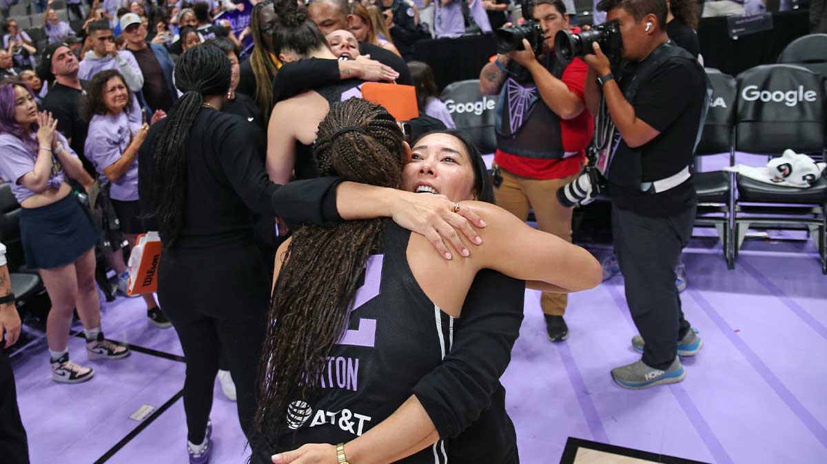 Golden State Valkyries head coach Natalie Nakase hugs guard Veronica Burton (22) after the loss against the Minnesota Lynx in game two of round one for the 2025 WNBA Playoffs at SAP Center. 