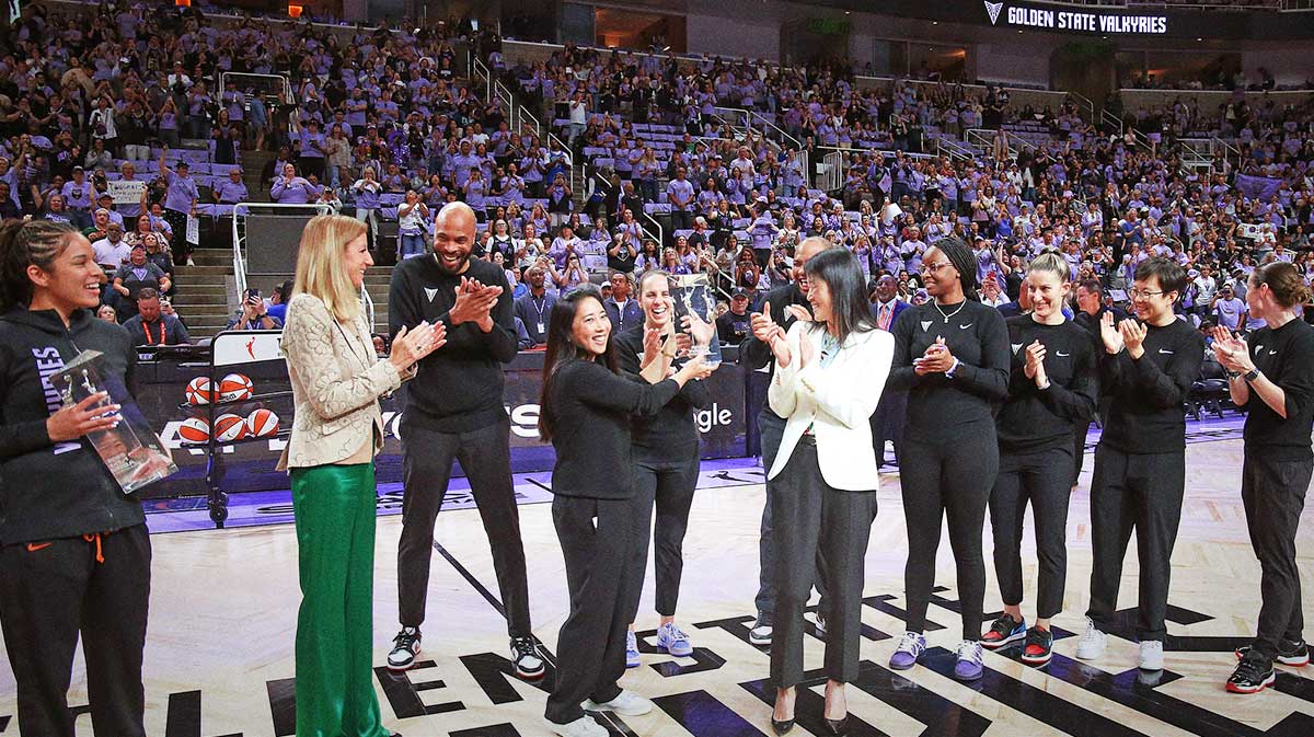 Golden State Valkyries head coach Natalie Nakase receives the Coach of the Year Award from WNBA Commissioner Cathy Engelbert before the game against the Minnesota Lynx in game two of round one for the 2025 WNBA Playoffs at SAP Center.