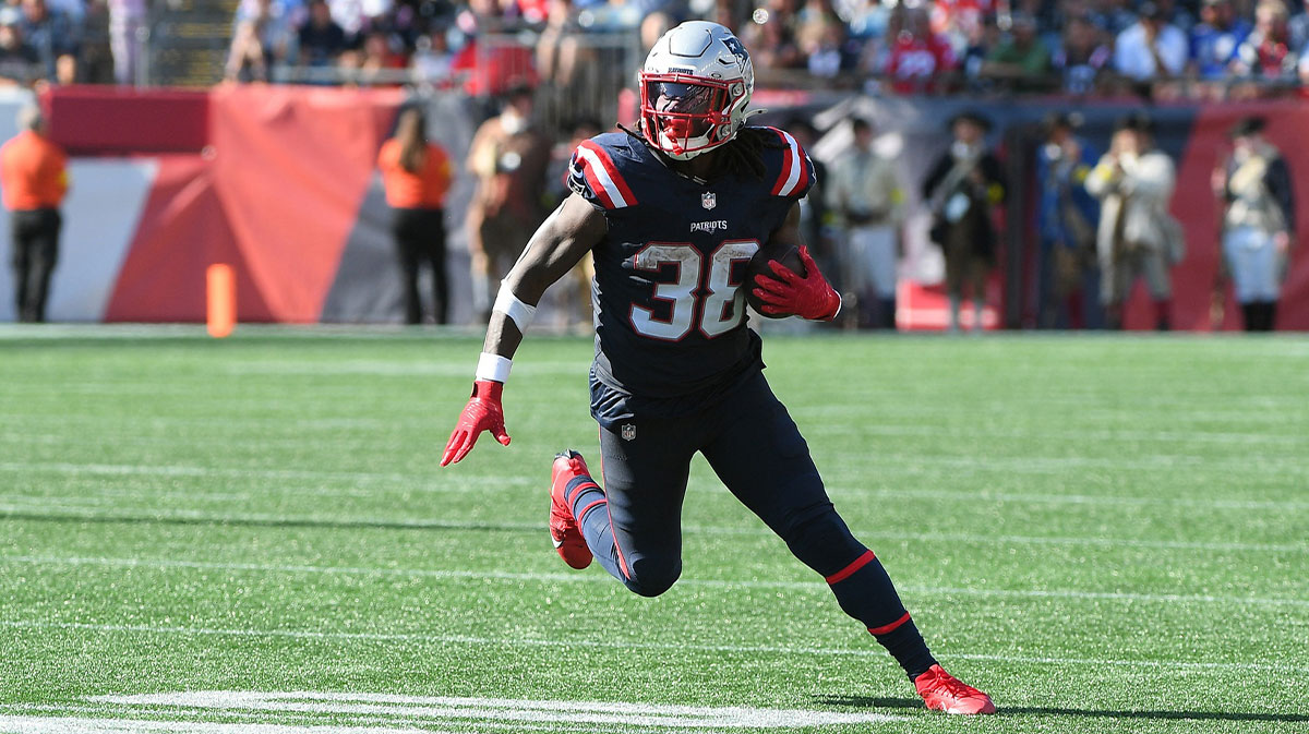 New England Patriots running back Rhamondre Stevenson (38) runs the ball during the second half against the Carolina Panthers at Gillette Stadium.