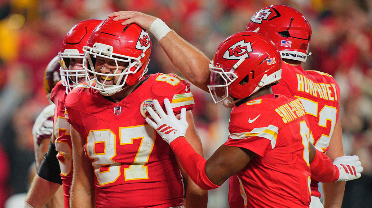 Kansas City Chiefs tight end Travis Kelce (87) celebrates after scoring a touchdown against the Washington Commanders during the third quarter of the game at GEHA Field at Arrowhead Stadium.