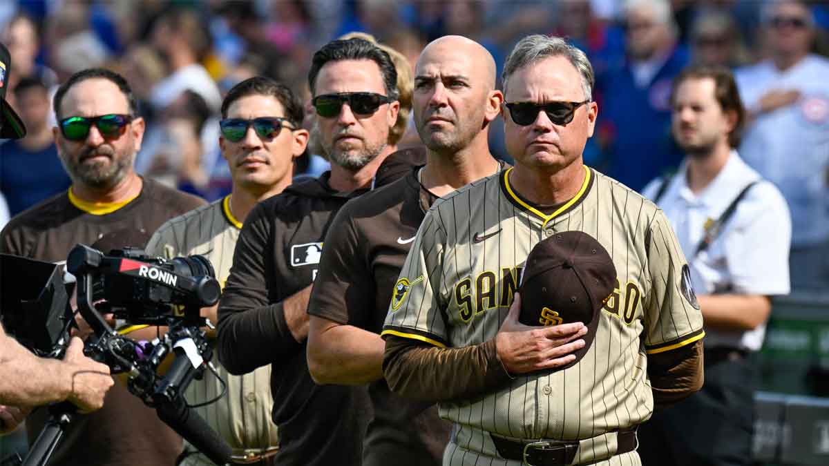 San Diego Padres manager Mike Shildt (8) stands during the National Anthem prior to the game against the Chicago Cubs during game two of the Wildcard round for the 2025 MLB playoffs at Wrigley Field.