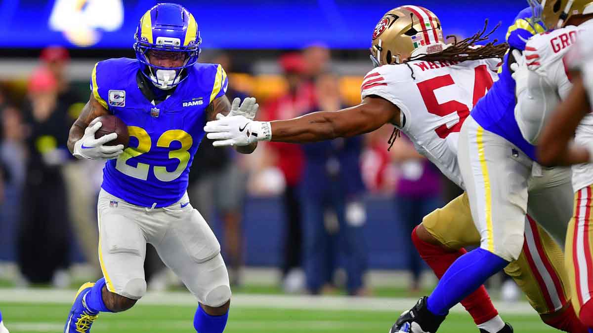 Los Angeles Rams running back Kyren Williams (23) rushes the ball against the San Francisco 49ers during the first half at SoFi Stadium.