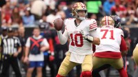 San Francisco 49ers quarterback Mac Jones (10) looks to throw downfield during the first quarter against the Houston Texans at NRG Stadium.