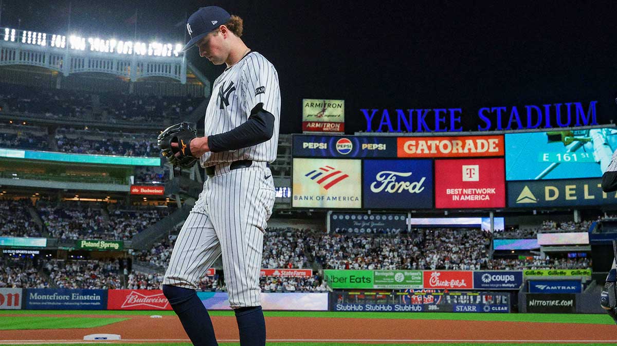 New York Yankees starting pitcher Cam Schlittler (31) walks in from the bullpen prior to game three of the Wildcard round for the 2025 MLB playoffs against the Boston Red Sox at Yankee Stadium. Mandatory Credit: Vincent Carchietta-Imagn Images