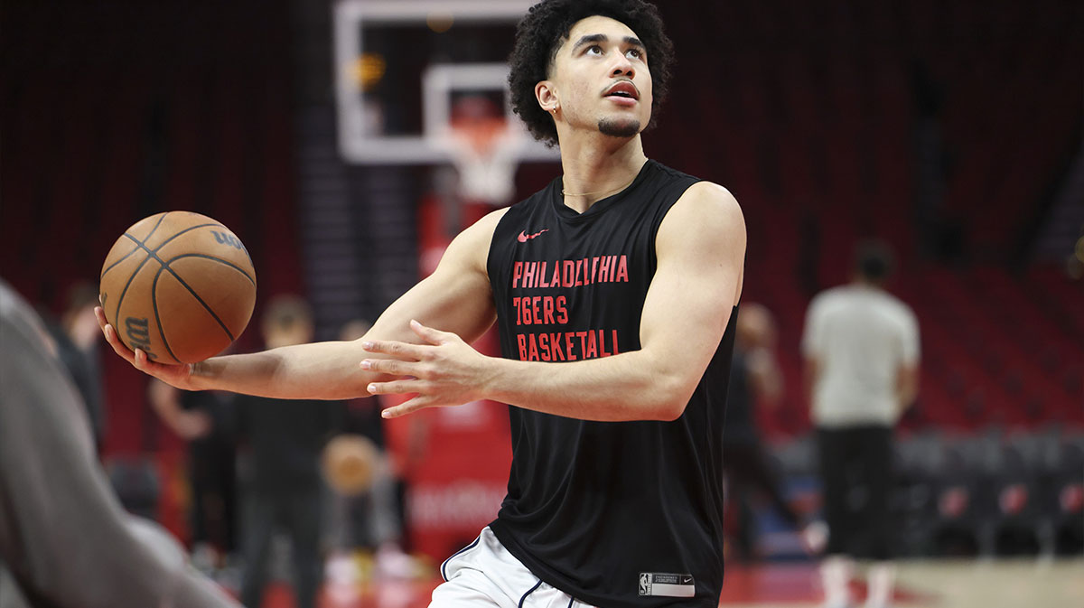 76ers guard Jared McCain (20) warms up before the game against the Houston Rockets at Toyota Center