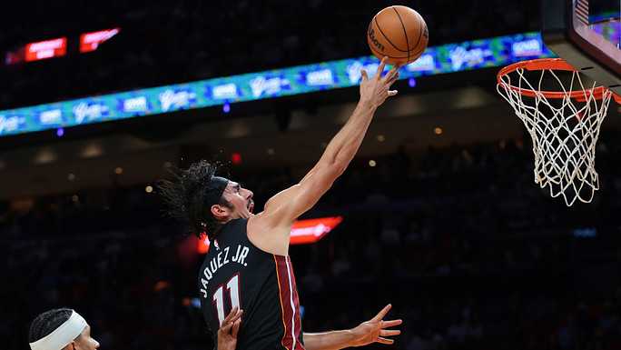 Miami Heat forward Jaime Jaquez Jr. (11) drives to the basket against the New York Knicks during the second quarter at Kaseya Center.