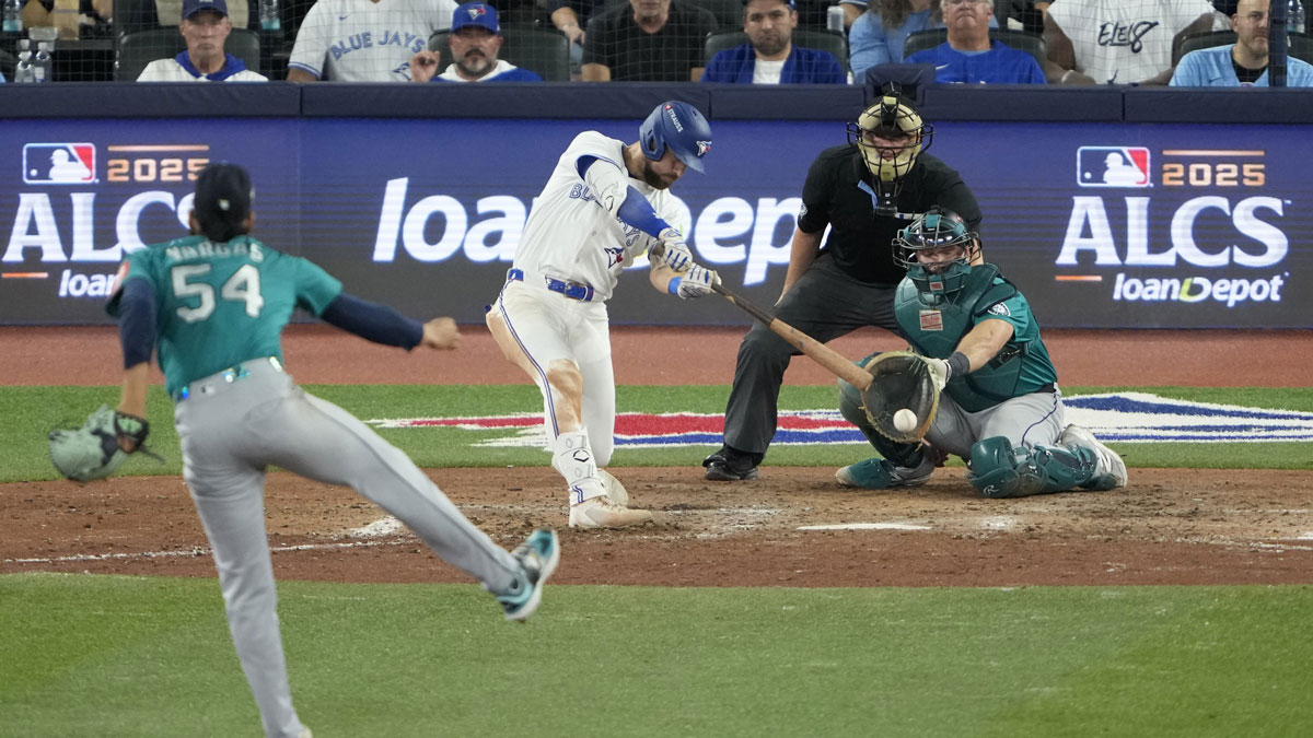 Toronto Blue Jays right fielder Nathan Lukes (38) hits a single against the Seattle Mariners in the eighth inning during game six of the ALCS round for the 2025 MLB playoffs at Rogers Centre.