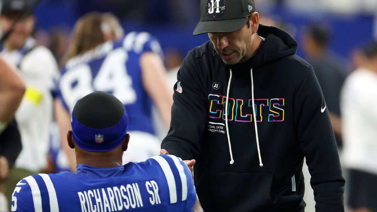 Indianapolis Colts head coach Shane Steichen greets quarterback Anthony Richardson (5) during warmups before the game between the Las Vegas Raiders and the Indianapolis Colts at Lucas Oil Stadium.