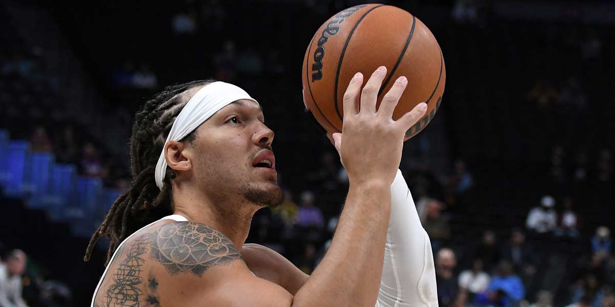 Denver Nuggets forward Aaron Gordon (32) warms up before the game against the Phoenix Suns at Ball Arena.