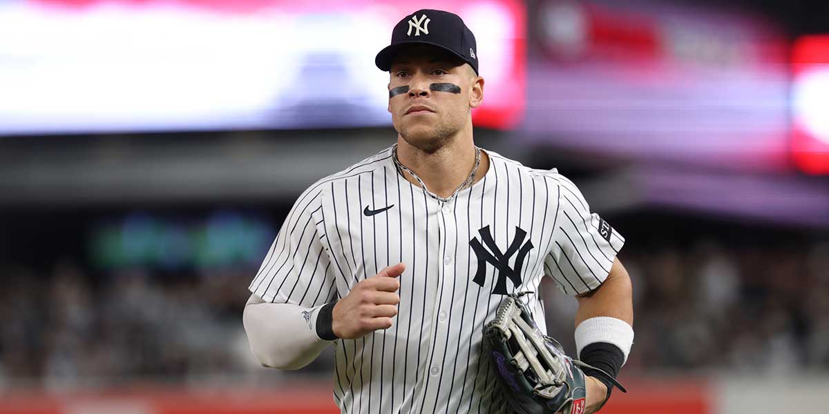 New York Yankees outfielder Aaron Judge (99) heads for the dugout between innings during game three of the Wildcard round for the 2025 MLB playoffs against the Boston Red Sox at Yankee Stadium.