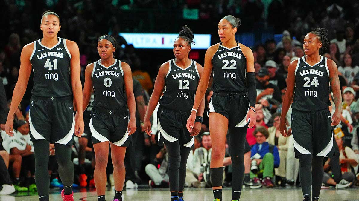 Las Vegas Aces center Kiah Stokes (41), Las Vegas Aces guard Jackie Young (0), Las Vegas Aces guard Chelsea Gray (12), Las Vegas Aces center A'ja Wilson (22), and Las Vegas Aces guard Jewell Loyd (24) take the court after an Indiana Fever time out in the fourth quarter of game five of the second round for the 2025 WNBA Playoffs at Michelob Ultra Arena.