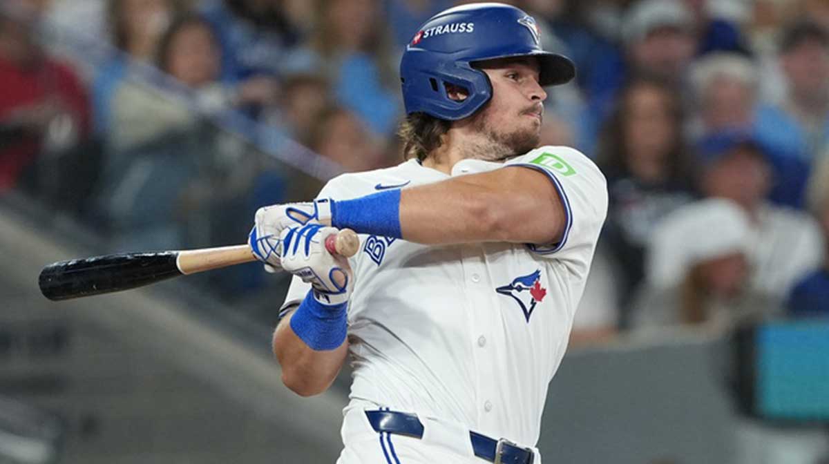 Toronto Blue Jays third baseman Addison Barger (47) singles in the fourth inning against the Seattle Mariners during game seven of the ALCS round for the 2025 MLB playoffs at Rogers Centre.