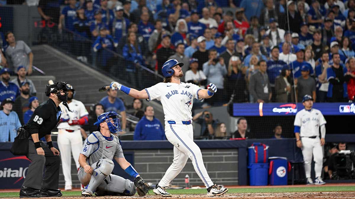 Toronto Blue Jays right fielder Addison Barger (47) hits a grand slam against the Los Angeles Dodgers in the sixth inning during game one of the 2025 MLB World Series at Rogers Centre.