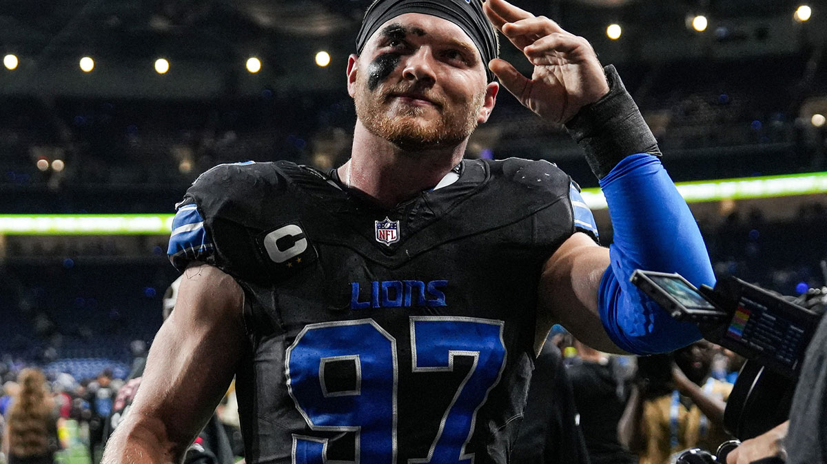 Detroit Lions defensive end Aidan Hutchinson (97) waves at fans after 24-9 win over Tampa Bay Buccaneers at Ford Field in Detroit on Monday, Oct. 20, 2025.