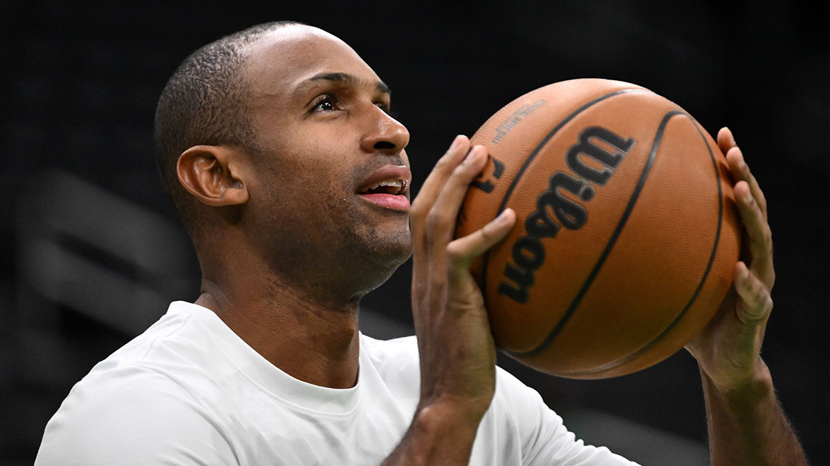 Boston Celtics center Al Horford (42) takes a shot during warmups before a game against the Detroit Pistons at the TD Garden