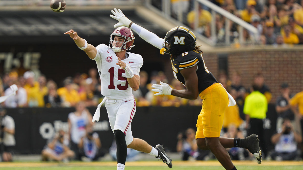 Alabama Crimson Tide quarterback Ty Simpson (15) throws against Alabama Crimson Tide defensive back Chuck McDonald III (19) during the second half of the game at Faurot Field at Memorial Stadium. 