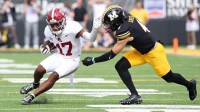 Alabama Crimson Tide wide receiver Lotzeir Brooks (17) runs the ball against Missouri Tigers safety Trajen Greco (4) during the second half at Faurot Field at Memorial Stadium.
