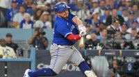 Toronto Blue Jays catcher Alejandro Kirk (30) hits a three run home run against the Los Angeles Dodgers in the fourth inning during game three of the 2025 MLB World Series at Dodger Stadium.