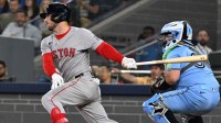 Boston Red Sox third baseman Alex Bregman (2) hits a single against the Toronto Blue Jays in the first inning at Rogers Centre.