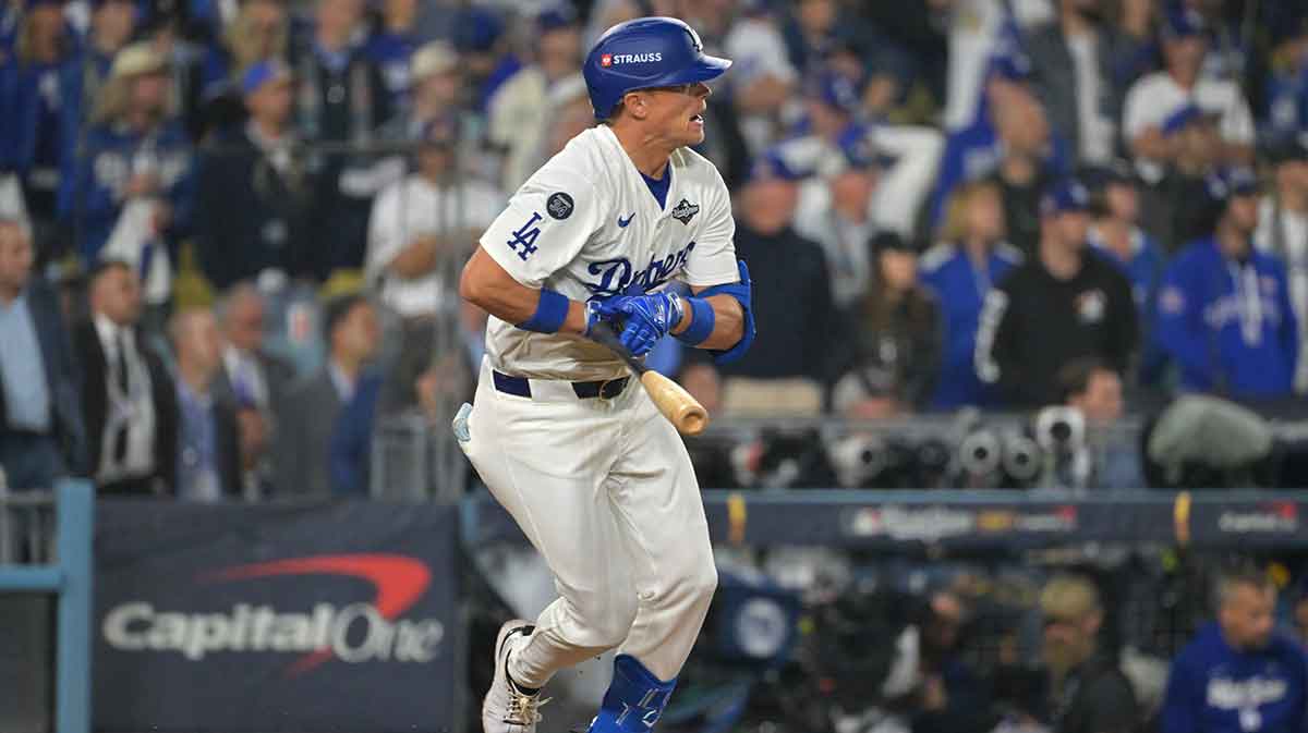 Los Angeles Dodgers right fielder Alex Call (12) runs after hitting a single against the Toronto Blue Jays in the seventeenth inning during game three of the 2025 MLB World Series at Dodger Stadium.