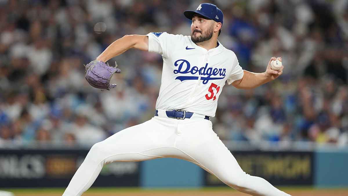 Los Angeles Dodgers pitcher Alex Vesia (51) pitches against the Milwaukee Brewers in the seventh inning during game four of the NLCS round for the 2025 MLB playoffs at Dodger Stadium.