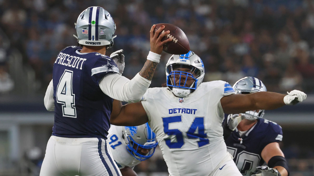 Detroit Lions defensive tackle Alim McNeill (54) rushes Dallas Cowboys quarterback Dak Prescott (4) during the second half at AT&T Stadium.