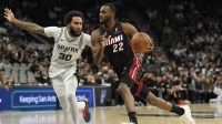Miami Heat forward Andrew Wiggins (22) drives to the basket against San Antonio Spurs forward Julian Champagnie (30) during the second half at Frost Bank Center.