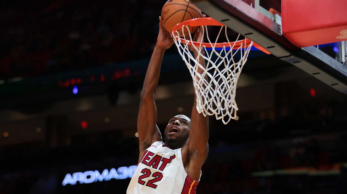 Miami Heat forward Andrew Wiggins (22) dunks against the Milwaukee Bucks during the first quarter at Kaseya Center. 