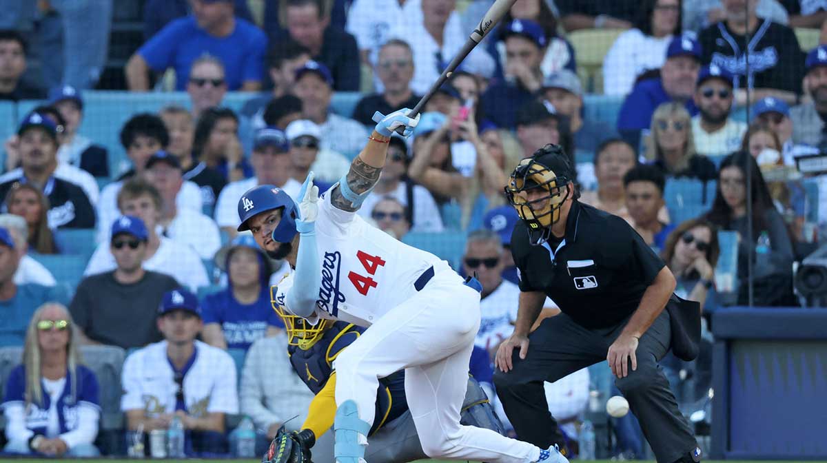 Los Angeles Dodgers center fielder Andy Pages (44) hits a single against the Milwaukee Brewers in the second inning during game three of the NLCS round for the 2025 MLB playoffs at Dodger Stadium.