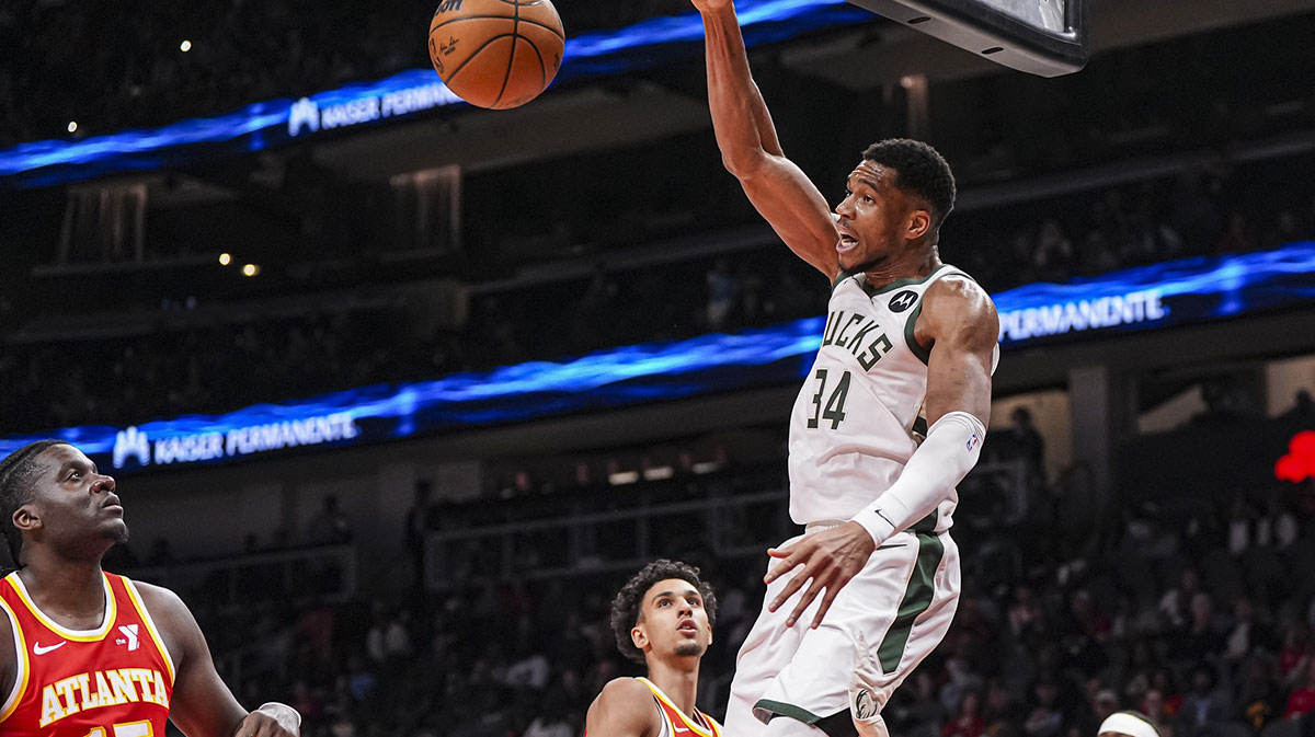 Milwaukee Bucks forward Giannis Antetokounmpo (34) dunks the ball against the Atlanta Hawks during the first half at State Farm Arena.