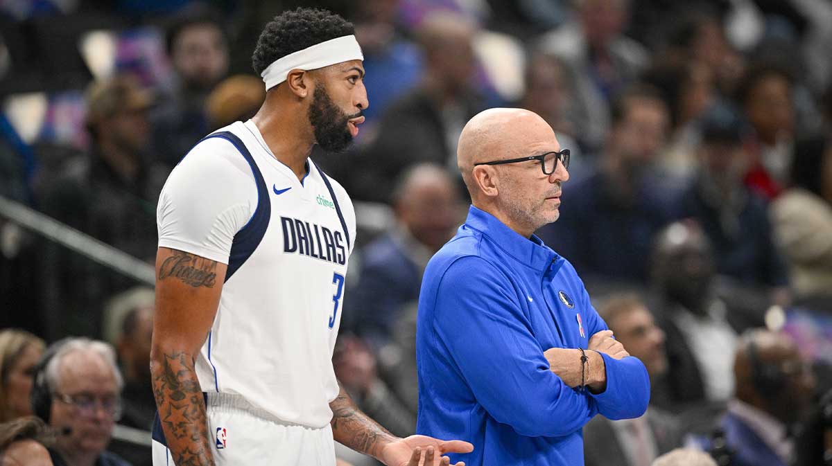 Dallas Mavericks forward Anthony Davis (3) exchanges words with Dallas Mavericks head coach Jason Kidd as Davis walks off the court during the first quarter at the American Airlines Center.