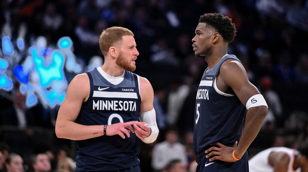Minnesota Timberwolves guard Donte Divincenzo and guard Anthony Edwards (5) talk during the second half against the New York Knicks at Madison Square Garden.