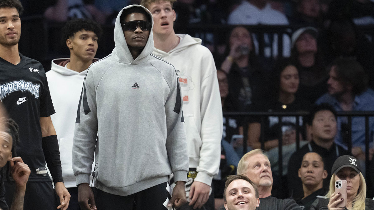 Minnesota Timberwolves guard Anthony Edwards (5) stands from the bench after injuring his hamstring in the first half against the Indiana Pacers in the at Target Center.