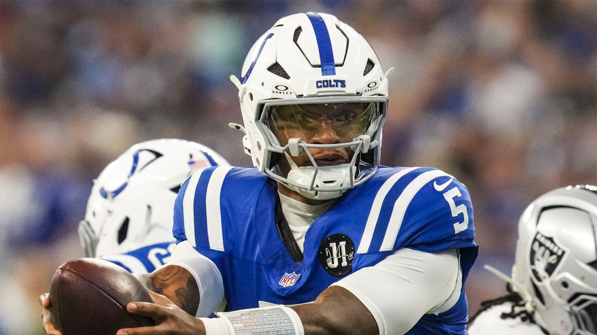 Indianapolis Colts quarterback Anthony Richardson (5) hands off the ball Sunday, Oct. 5, 2025, during a game against the Las Vegas Raiders at Lucas Oil Stadium in Indianapolis. The Indianapolis Colts defeated the Las Vegas Raiders, 40-6.